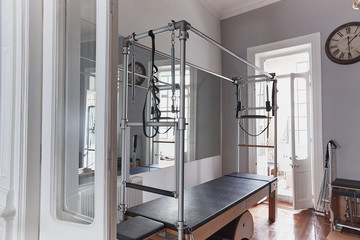 Pilates salon club with new equipment for pilates in loft style place