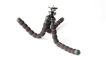 Naklejka premium flexible tripod isolated on white