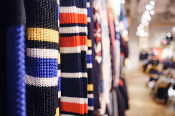 colorful hoody for sale in clothes store, selective focus. copy-space