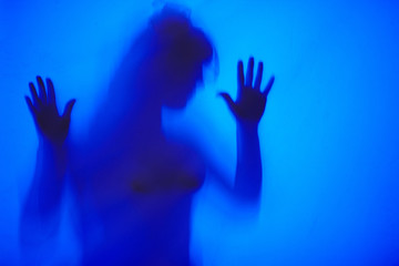 Woman hostage blurred abuse victim concept