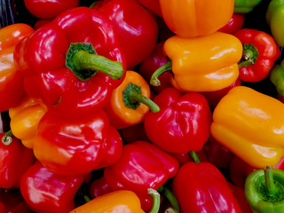 Orange , red & yellow peppers background 