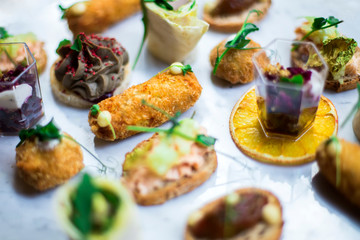 Appetizers table with different antipasti snacks