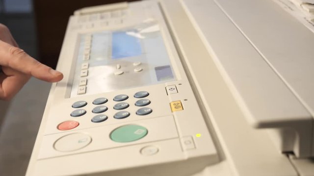 Detail of a modern digital printer of a copy center