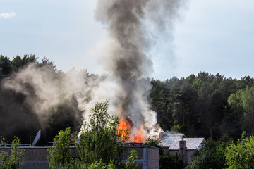 Fototapeta na wymiar Rooftop on fire