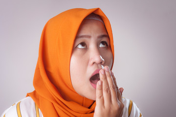 Cute Asian Muslim Lady Check Her Own Breath Smell