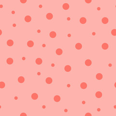 Pink seamless pattern with polka dots. Vector illustration.