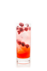 Sweet raspberry Tom collins cocktail isolated on white background. Selective focus. Shallow depth of field.