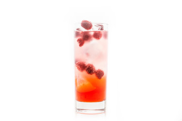 Sweet raspberry Tom collins cocktail isolated on white background. Selective focus. Shallow depth of field.