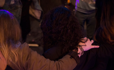 woman with hands on shoulders