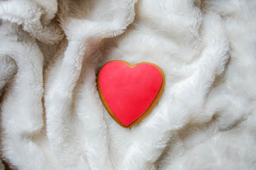 small red heart on a white blanket