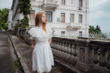 Fototapeta premium Attractive young woman enjoying her time outside in park