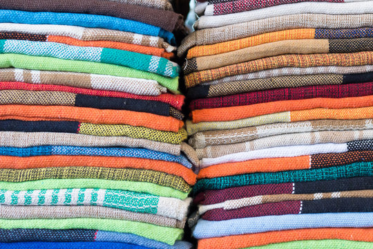 Brazilian handicraft doormat (capacho) stacked from northeast of Brazil . Colorful patterns taken in Feira de Sao Cristovao, Rio de Janeiro, Brazil. 2017