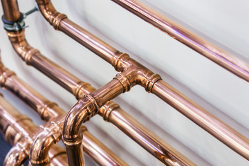 copper pipes and fittings for carrying out plumbing work. Plumbing, fixing pipes and fittings for...