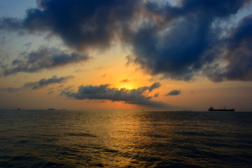 Fototapeta na wymiar Landscape sea under scenic colorful sky at sunset dawn sunrise.