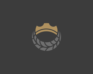 Crown tire logotype. Auto tyre cogweel king vector logo.
