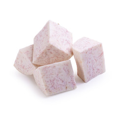 Cube of taro root isolated on a white background.