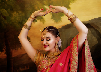 Female dancer dressed in traditional Indian clothing