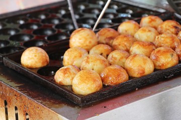 Takoyaki is delicious Japanese food on pan