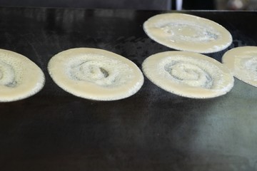 Making crispy pancake delicious at street food