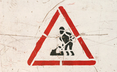 Funny road construction traffic sign made with stencil very unpropotional figure