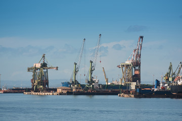 Industrial shipping cranes in the port of Taranto, Italy, Puglia