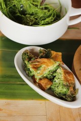 Fried acacia pennata omelette at street food