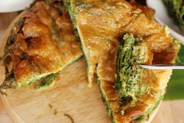 Fried acacia pennata omelette at street food