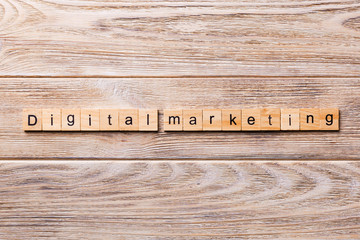 Digital Marketing word written on wood block. Digital Marketing text on wooden table for your desing, concept
