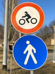 bicycle road sign and pedestrian sign close-up