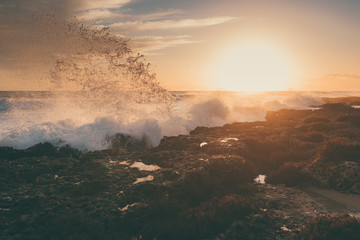 Amazing beach sunset with beautiful sunset and incredible foamy waves