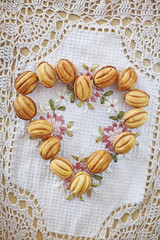 Traditional russian festive cookies in nut shape with caramelized milk inside