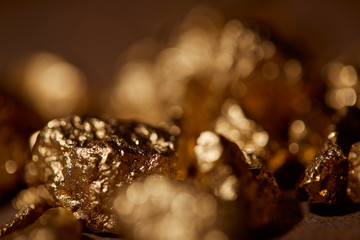 selective focus of golden stones with blurred background
