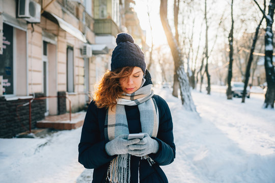 Young woman wearing warm scarf