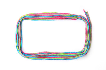Colorful rectangular  frame made of thread isolated on white background. Empty frame of cotton thread.