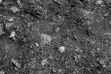 Art gray background of of limestone with stones and crumbs. Nature limestone textured wall for publication, poster, calendar, screensaver, wallpaper, postcard, cover, website. High quality photo