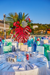 Festive served sea view terrace restaurant for corporate banquet or wedding