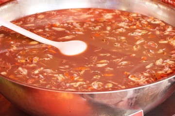 preserved shellfish in bowl at street food