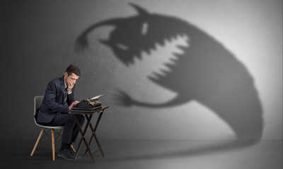 Little hard worker afraid of scary monster shadow
