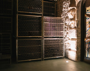 Wine barrels stored in a winery on the fermentation process