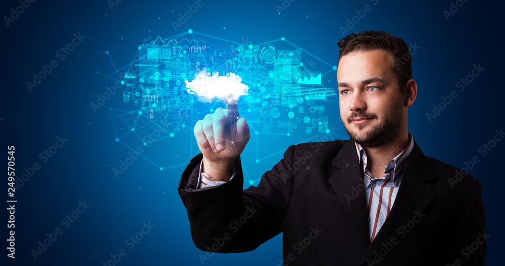 Aufkleber Man touching hologram projection displaying information from cloud based system

