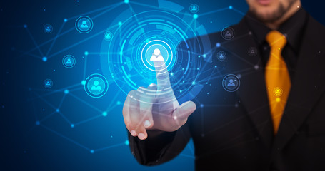 Man touching hologram screen displaying keys and locks