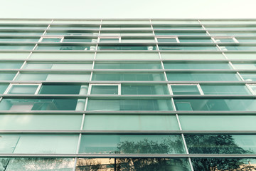 Obraz premium Urban architecture. Close up of an office building facade.