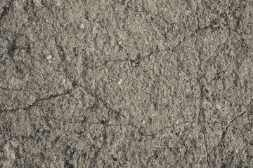 Textured light brown concrete wall as an abstract background. Concrete backdrop for post, screensaver, wallpaper, postcard, poster, banner, cover, header for website. High quality photo