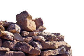 old ancient ruined pile of bricks and stone blocks foreground closeup isolated on white background