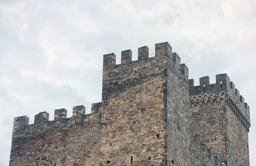 beautiful old ancient mountain castle - Genoese fortress with stone walls with battlements in Crimea. The medieval citadel