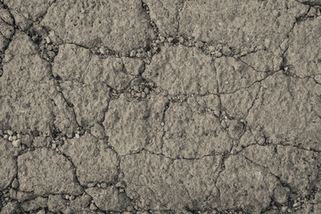 Light brown textured concrete wall as an abstract background with cracks for poster, calendar, post, screensaver, wallpaper, postcard, card, banner, cover, website. A place for your design or text