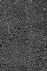 Dark gray background of textured concrete