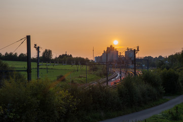 Obraz premium Beautiful sunset over the fields