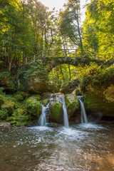 Fototapeta na wymiar Müllerthall, Schiessentümpel Waterfall, Luxembourg