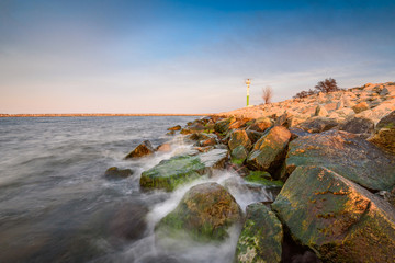 Sea waves crashing against the rocks in Gorki Zachodnie, Baltice Sea, Gdansk, Poland.